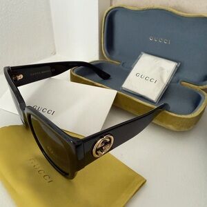 Gucci Black and Gold Sunglasses. New
